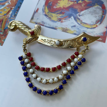 1970s Red, White, and Blue Sword Brooch Jewelry Bloomers and Frocks